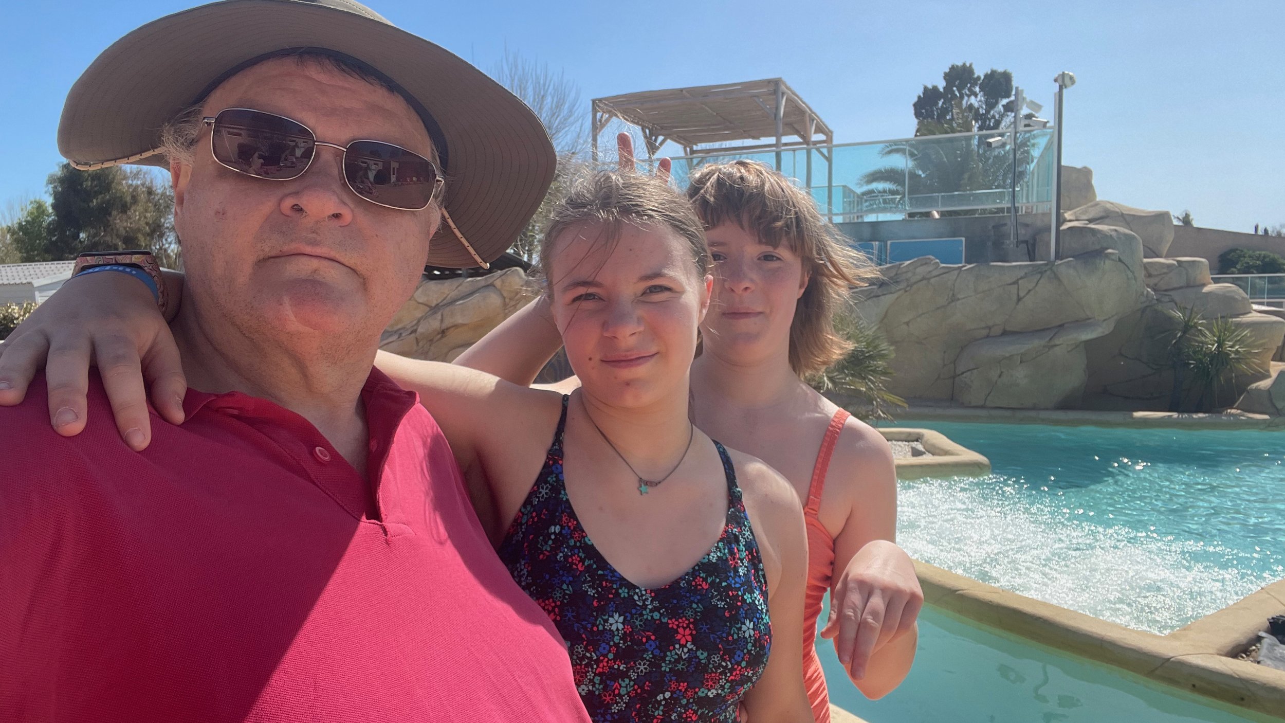 By the pool with the sisters, early 2022