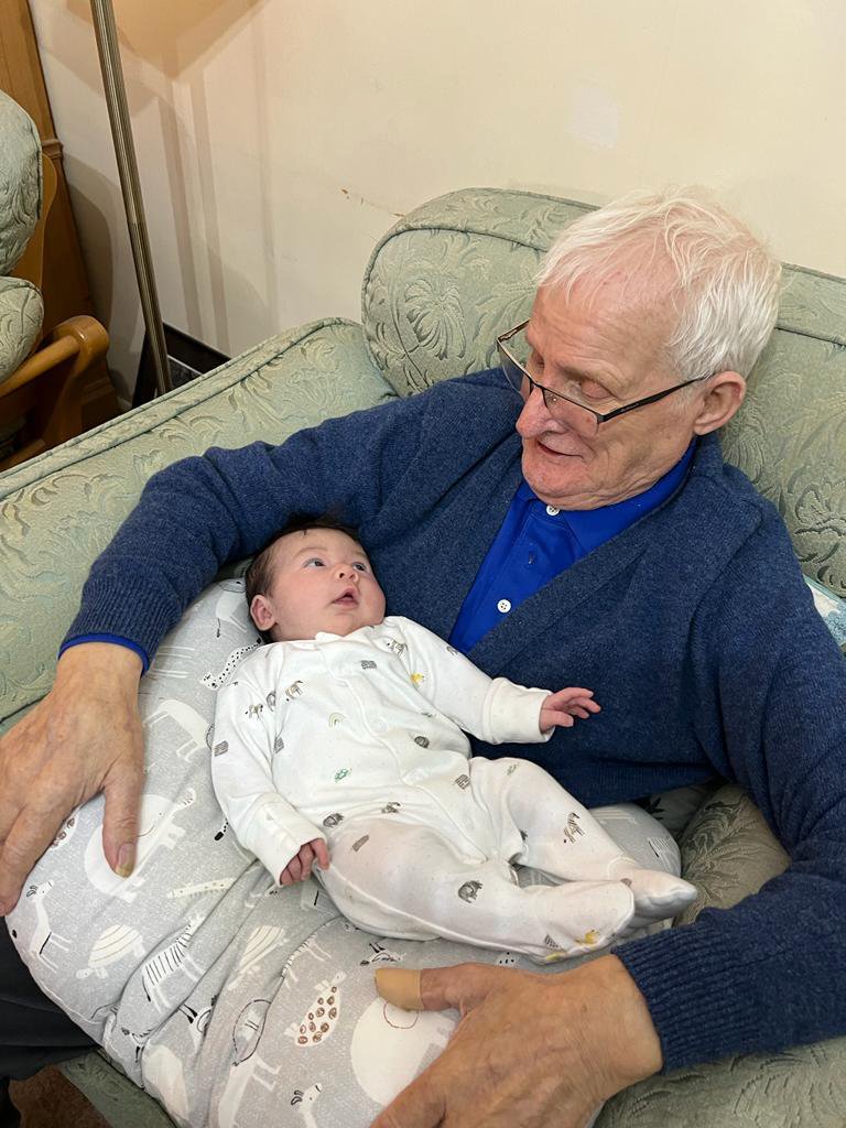 Dad with his great-granddaughter Maya